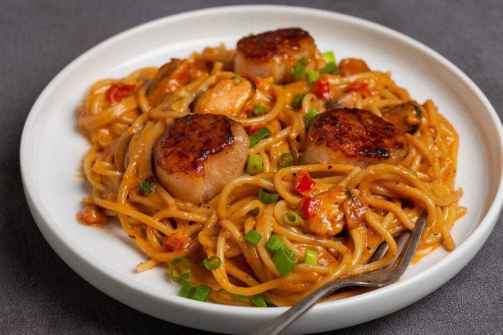 How to Prepare Cajun Seafood Pasta with Scallops and Mussels