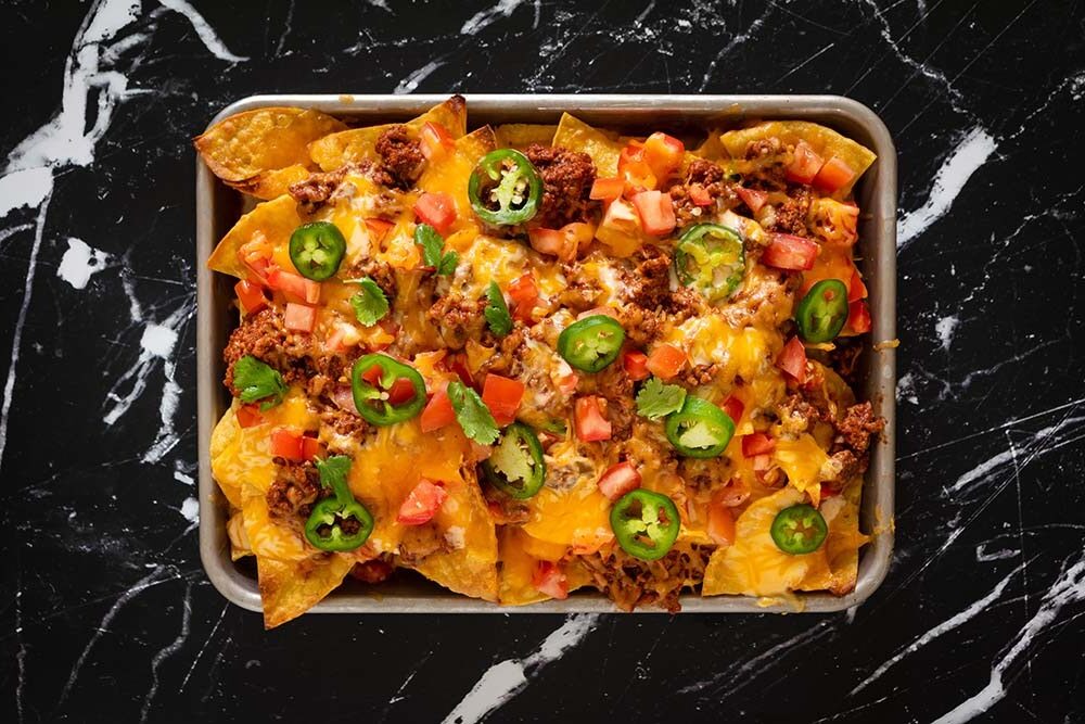How to Make Cheesy Nachos with Homemade Tortilla Chips